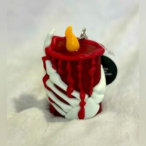 Bath & Body Works light up hand sanitizer holder keychain.